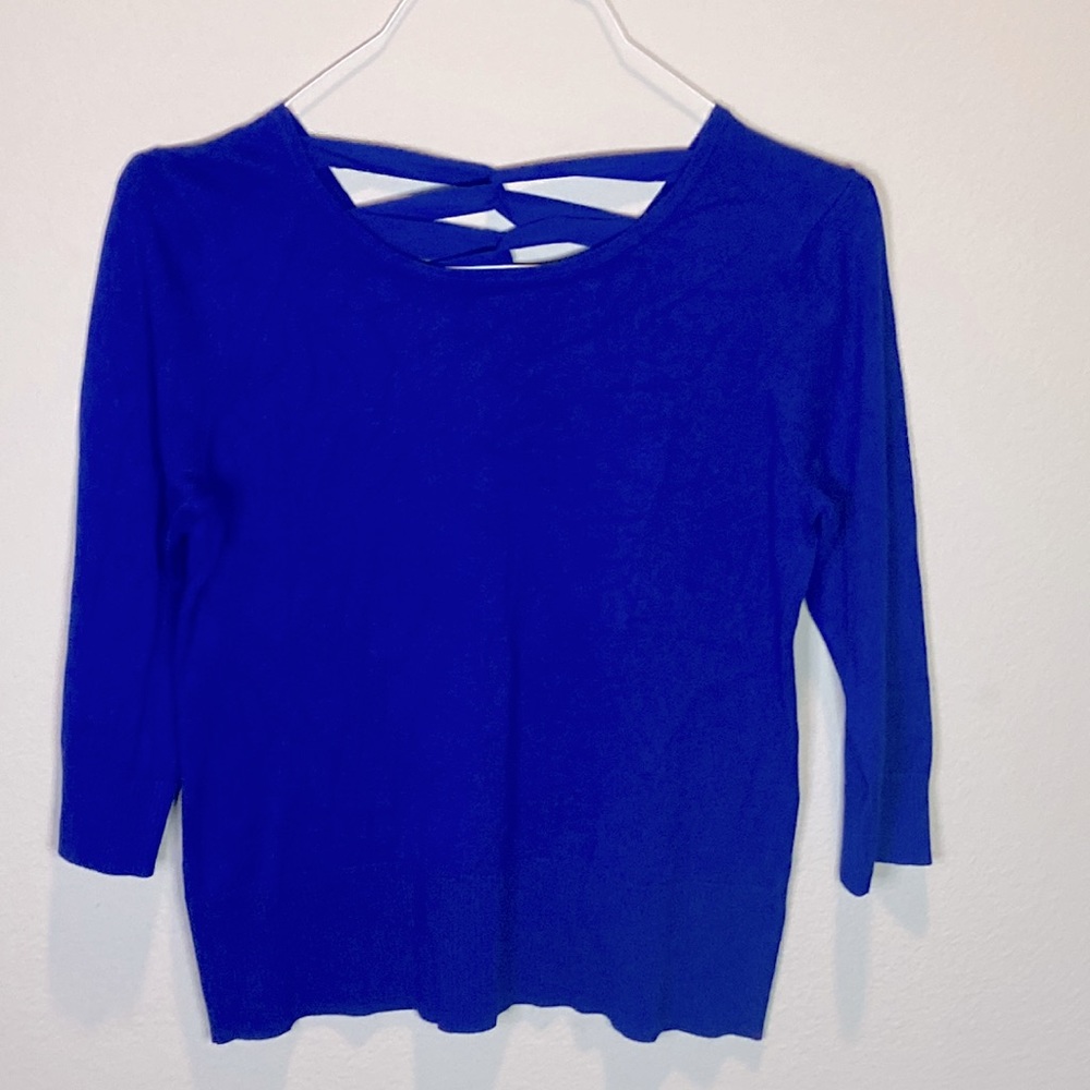 Women Blue sweater. Circular collar front and V shape back. By Cable & Gauge.